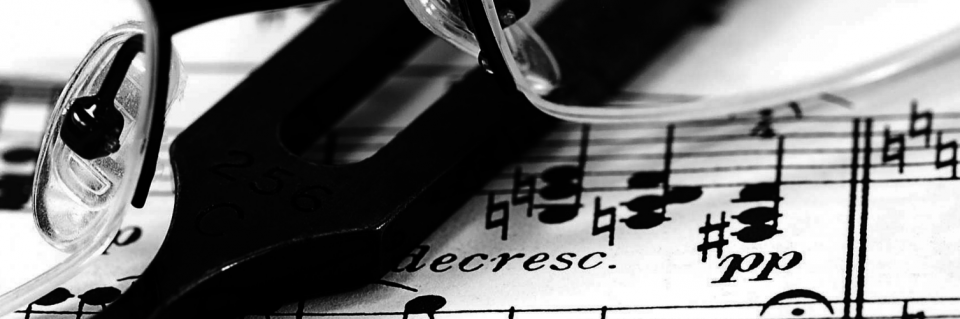 glasses on sheet music